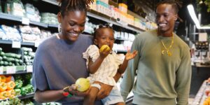 family with toddler in a grocery store