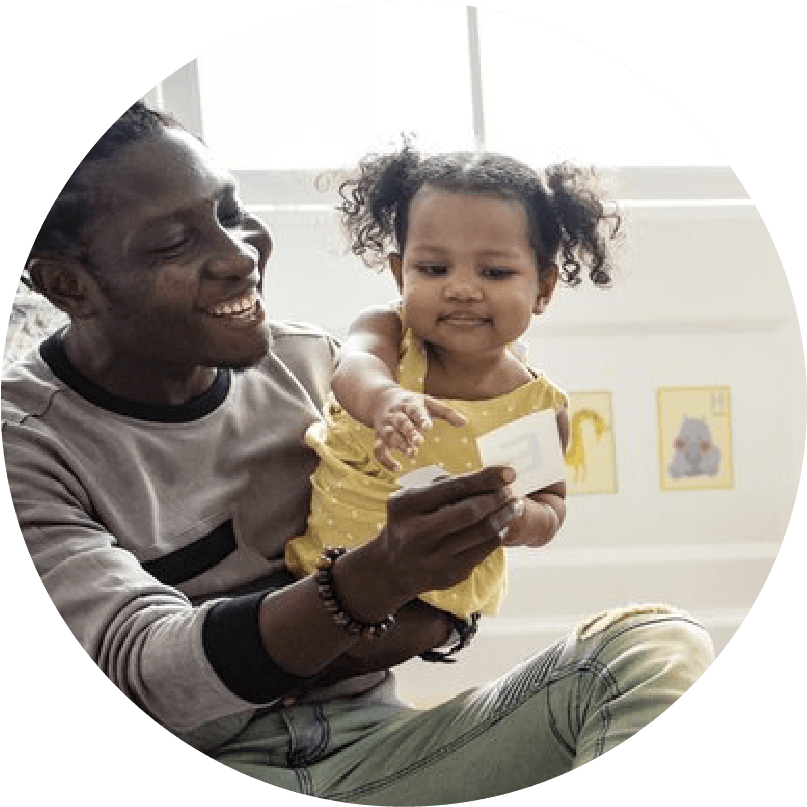 Father and daughter playing together.